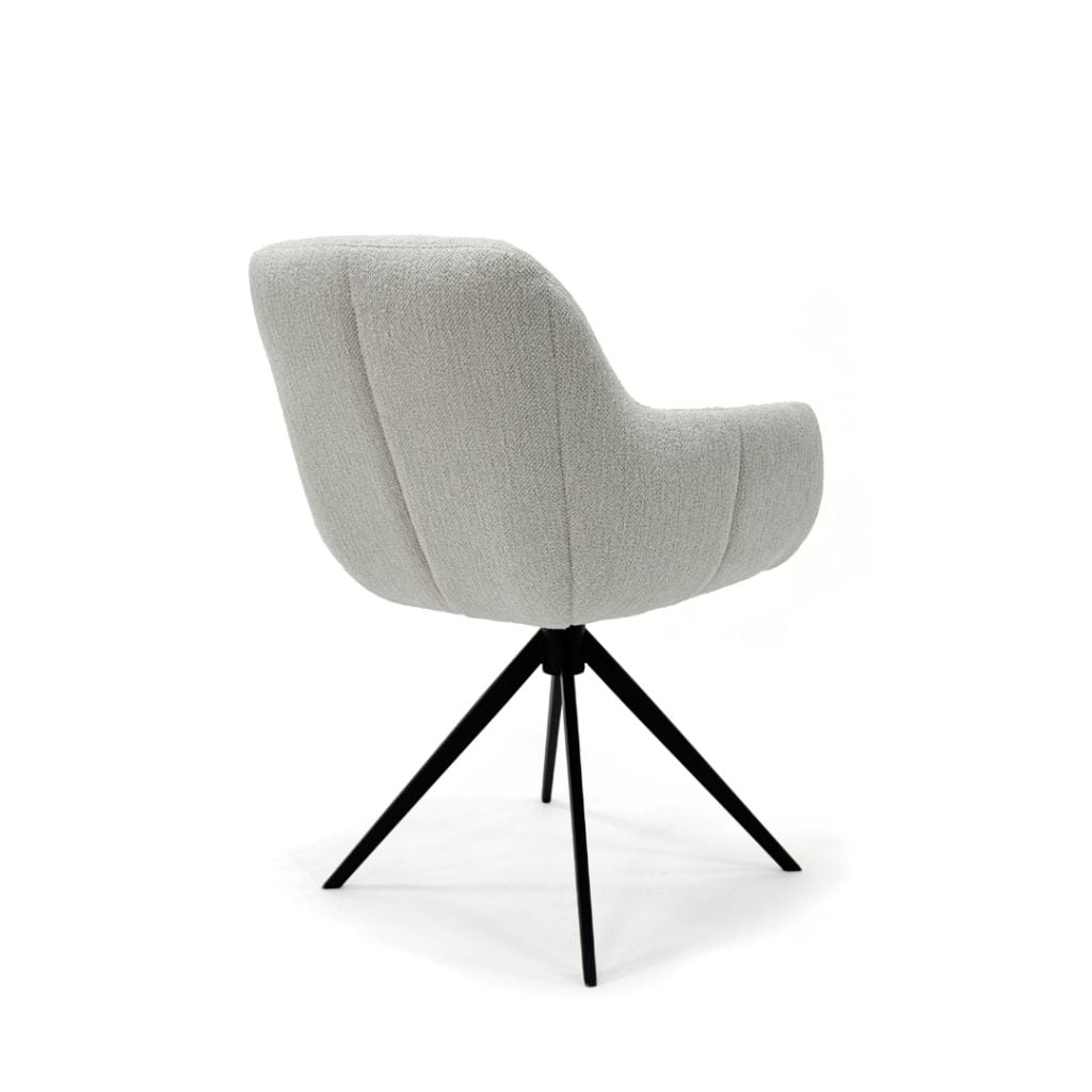 The Arthur is a modern dining chair with vertical stitching and metal legs, available in 22 fabrics and 3 leg colors.